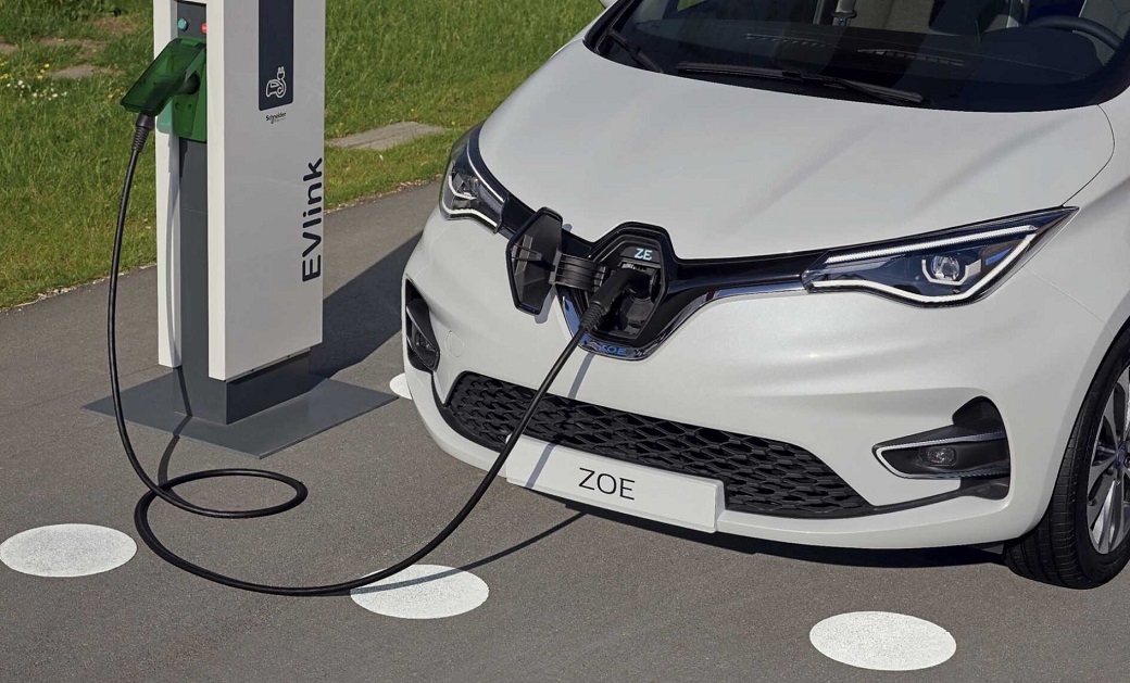 A Renault car plugged in to a charging point